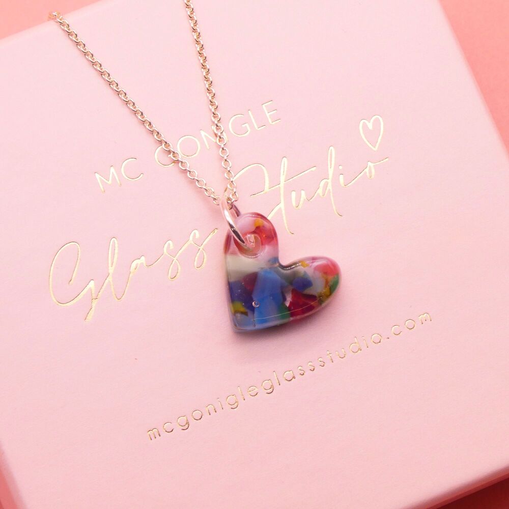 Multicoloured glass heart on silver