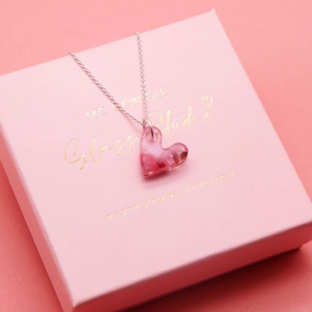 Pink glass heart on silver