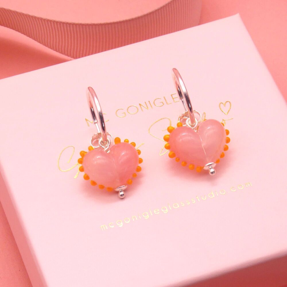 Dotty Pink and orange glass heart earrings on silver hoops