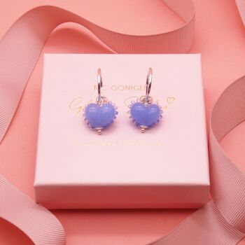 Dotty Blue glass heart earrings on silver hoops