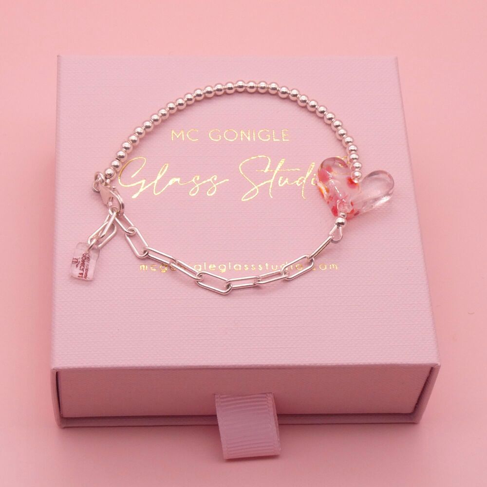 Clear and pink glass heart on a silver Long link bracelet