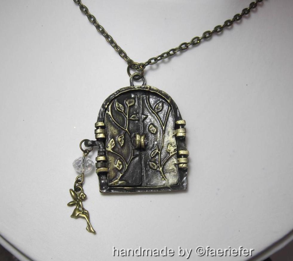 Vintage style bronze fairy portal necklace