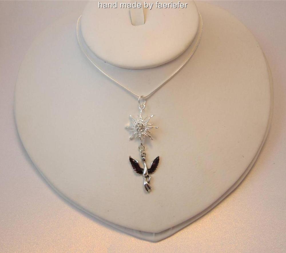 Stunning Phoenix rising necklace with crystal encrusted sun