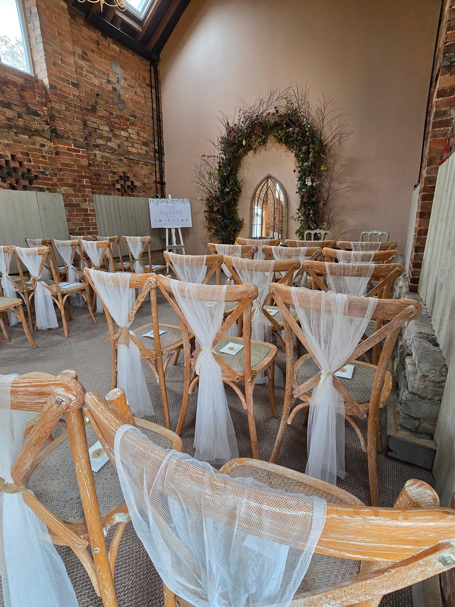Bride and groom exchanging vows in the wedding ceremony in The Granary