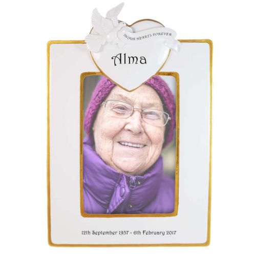 White Memorial Frame 'In our hearts forever' adorned with a heart and dove.