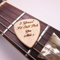 5th Anniversary Wooden Guitar Pick Engraved with your name or message.