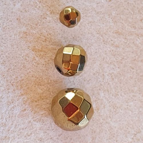 Golden Facetted Round Beads