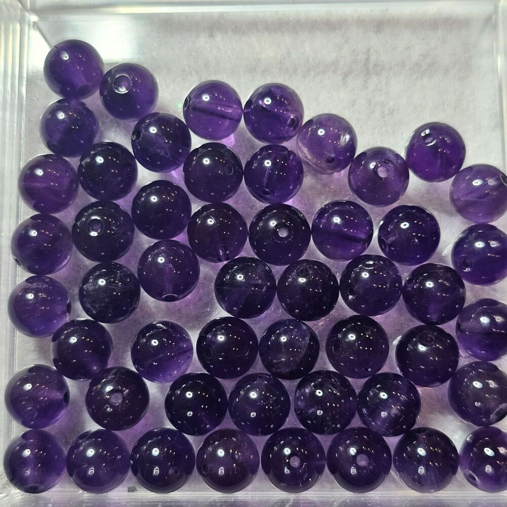 Amethyst Bead/ Beads - an example of a strand of beads