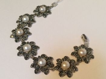 Silver and marcasite bracelet with pearls.