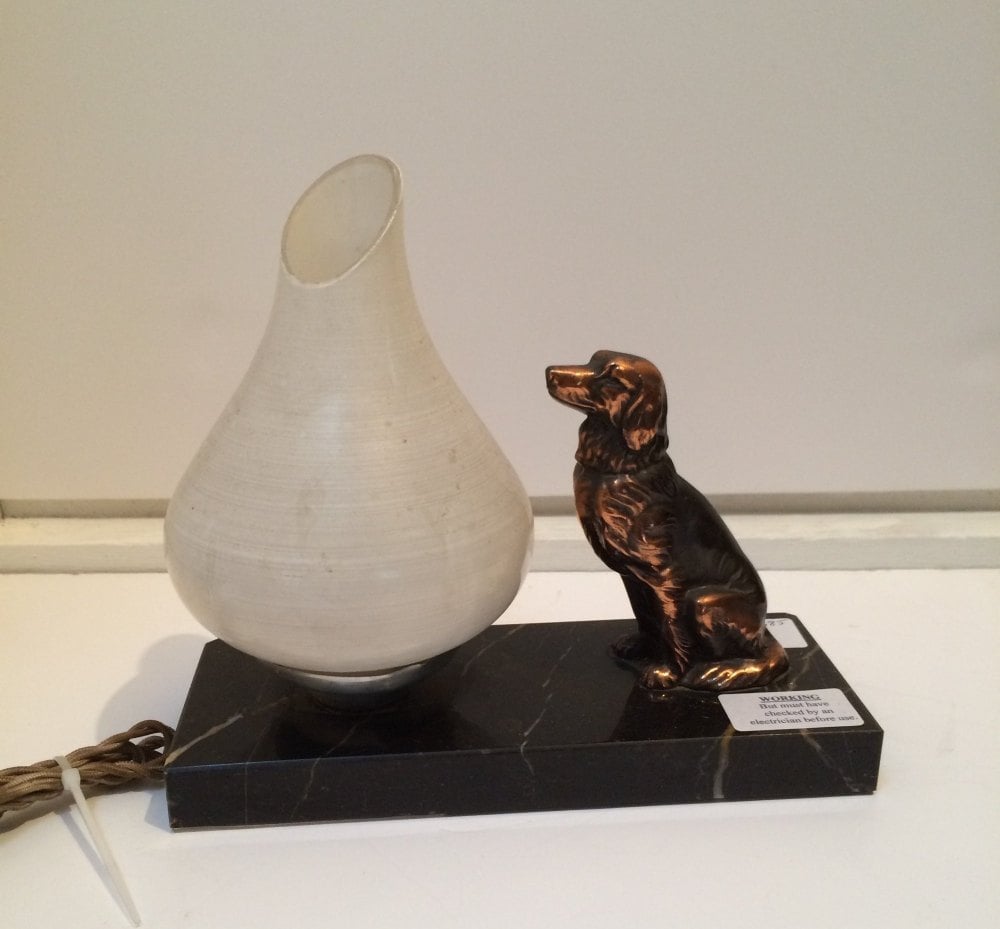 Dog figure with lamp