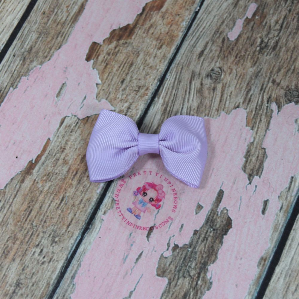 Minnie Bow On Croc Clip ~ Light Orchid