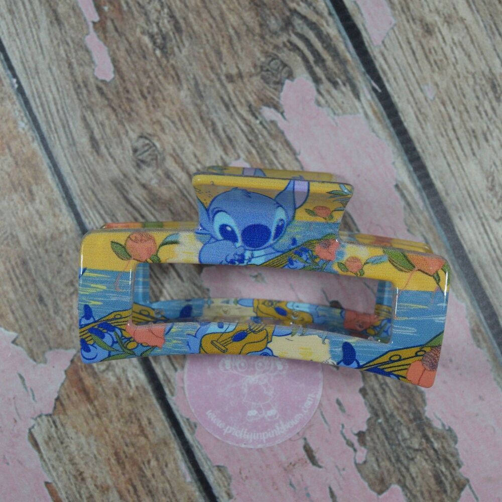 Rosie Claw Clip - Stich playing guitar