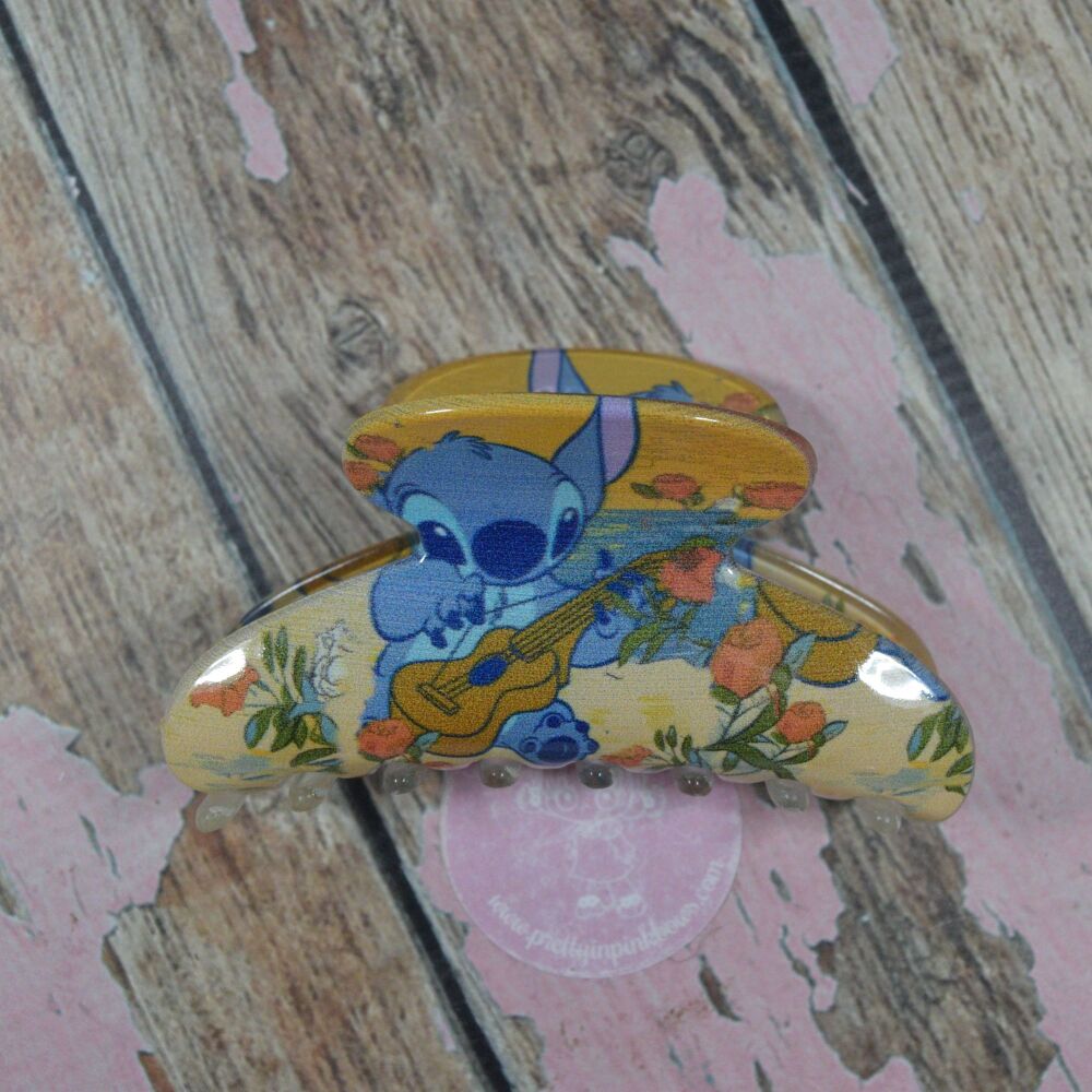 Lucy Claw Clips - Stich playing guitar