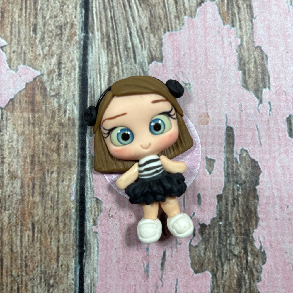 Black and white striped top with black RaaRaa skirt, blue eyes