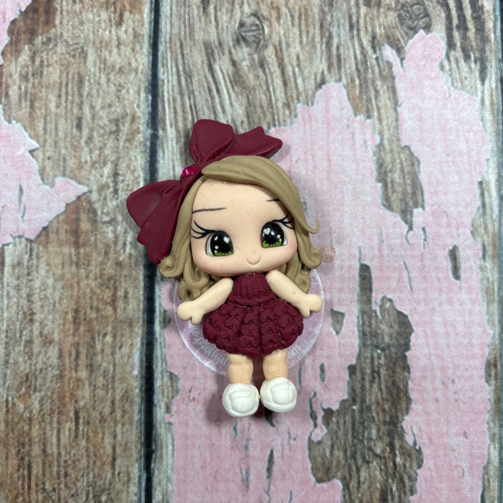 Little girl, burgundy knitted dress, big Bow dirty blonde hair green eyes
