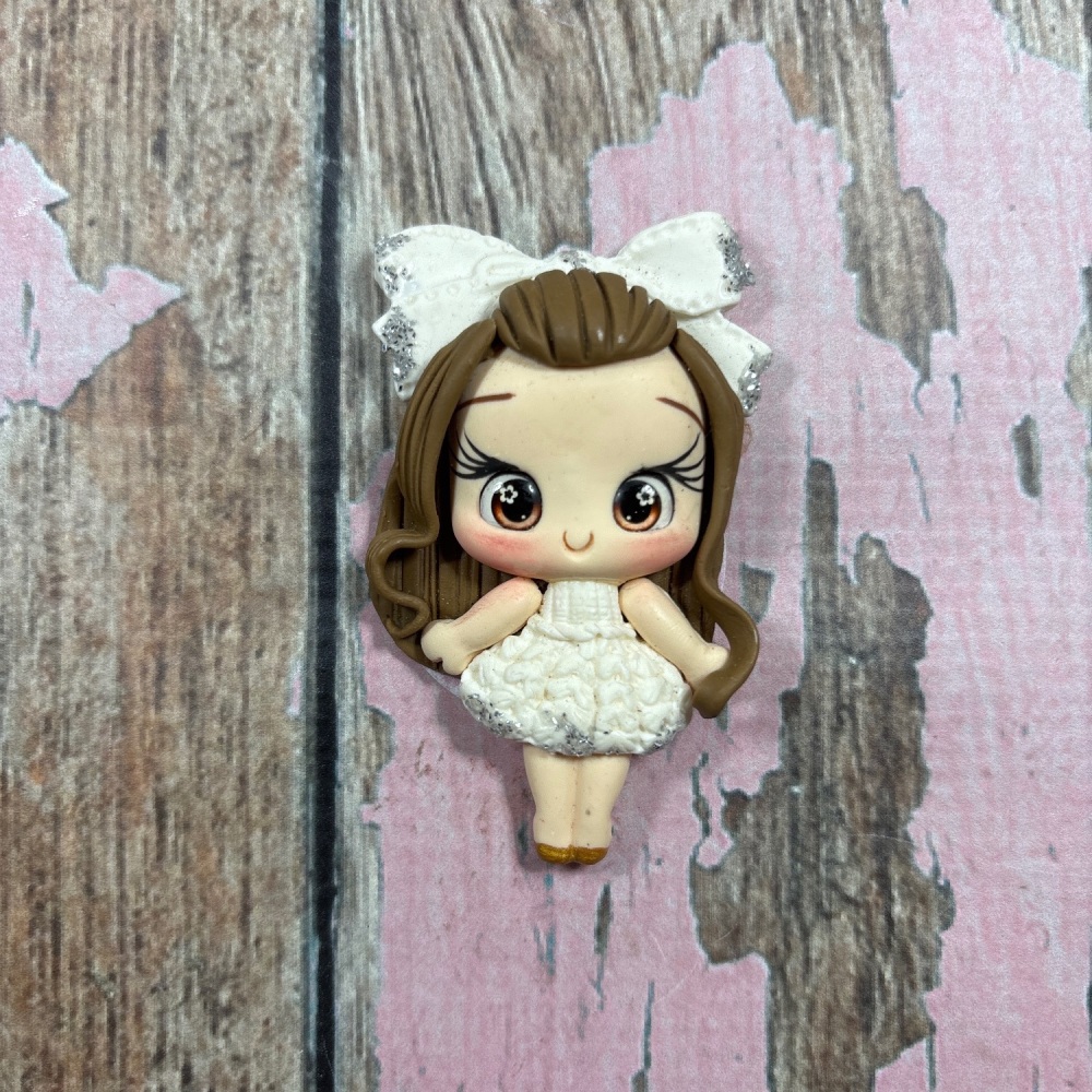 Little girl, white knitted dress, big bow light brown hair, brown eyes