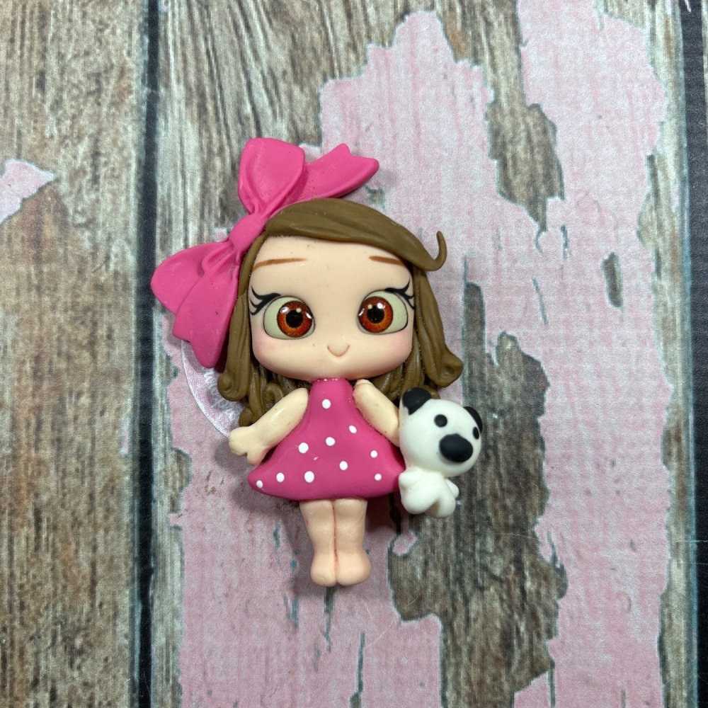 Little girl, pink polkadot dress, big bow teddy bear light brown hair, brown eyes