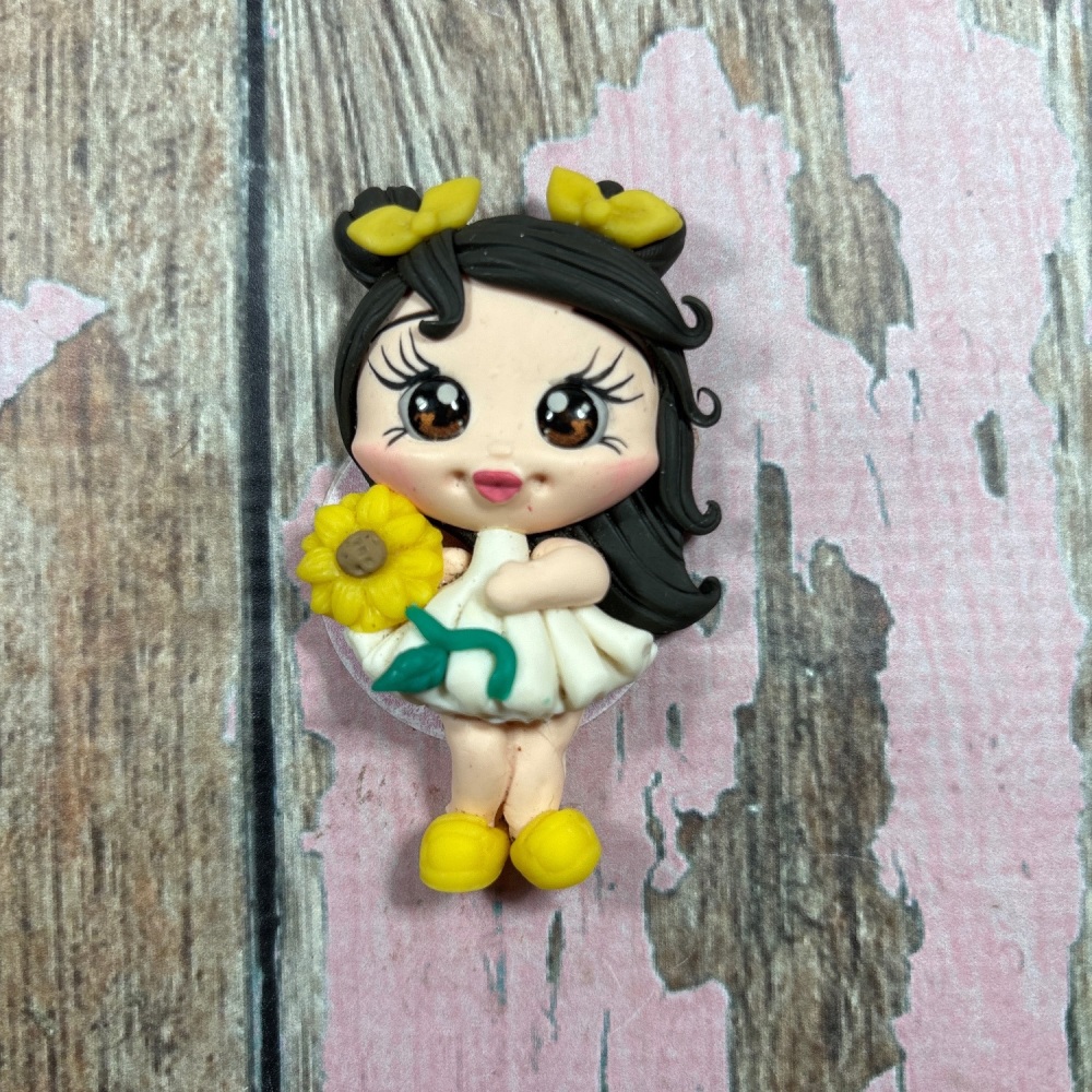 Little girl, white dress, sunflower brown hair, brown eyes