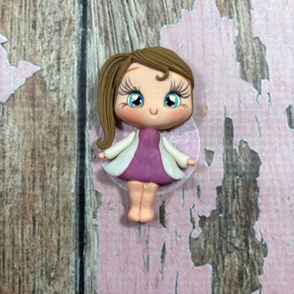 Little girl, purple dress, white coat, light brown hair, blue eyes