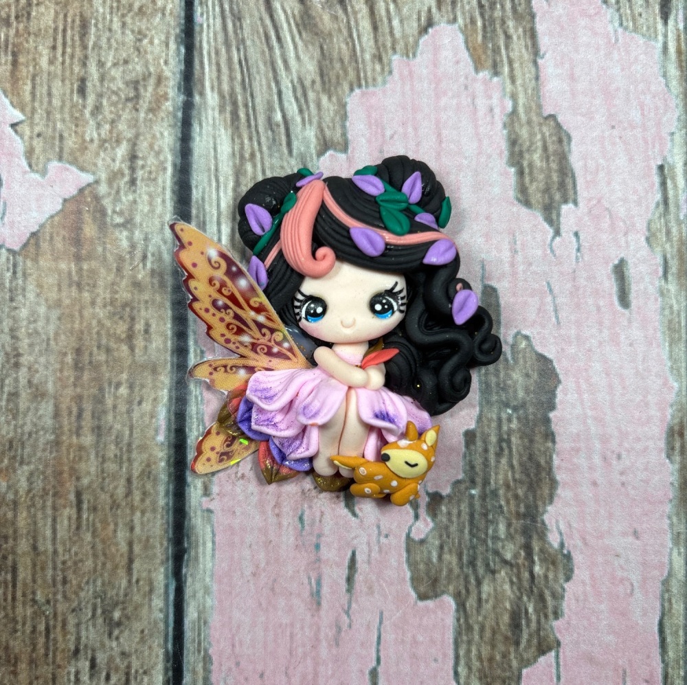 Big whimsical fairy black hair pet deer