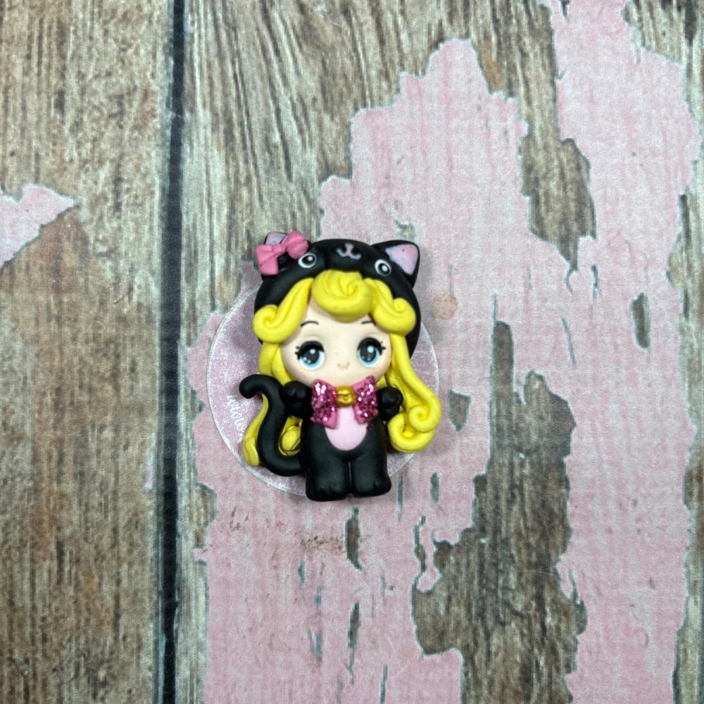 Little girl in cat costume blonde hair pink bow