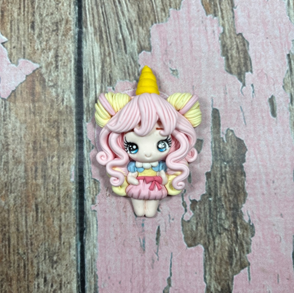 Big unicorn girl blonde hair pastel dress