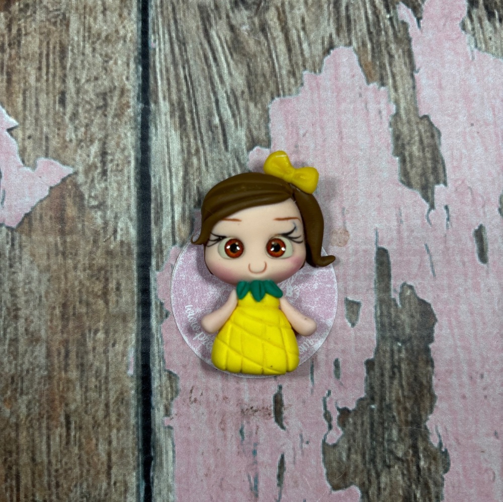 Little girl in pineapple dress brown hair