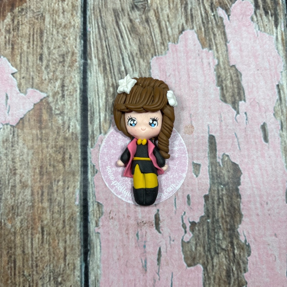 Little girl brown hair white bow brown jacket