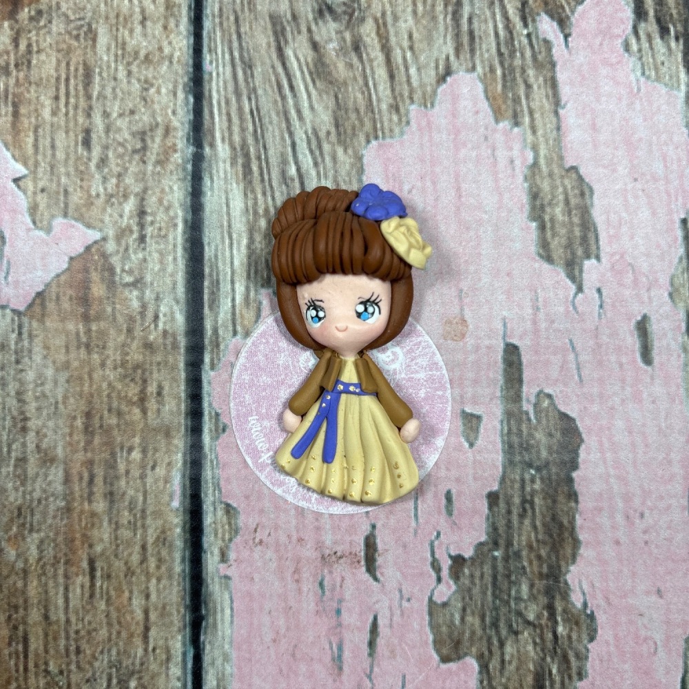 Little Girl brown hair yellow dress brown jacket