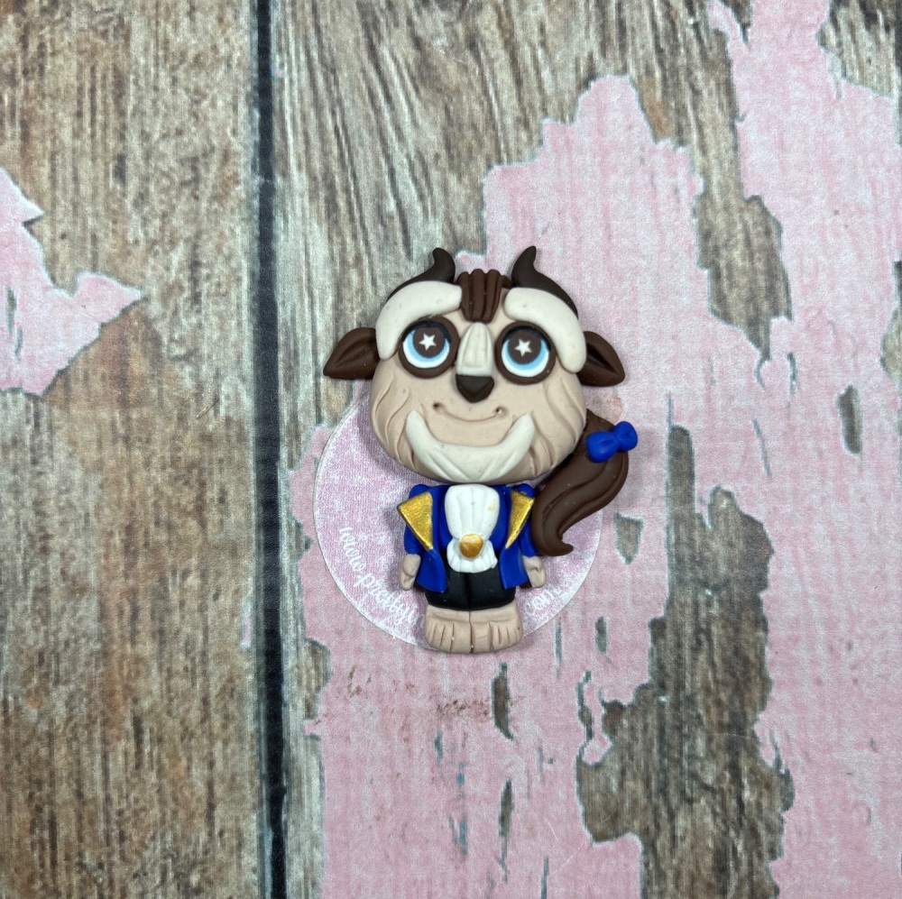 The Beast Blue suit and ponytail