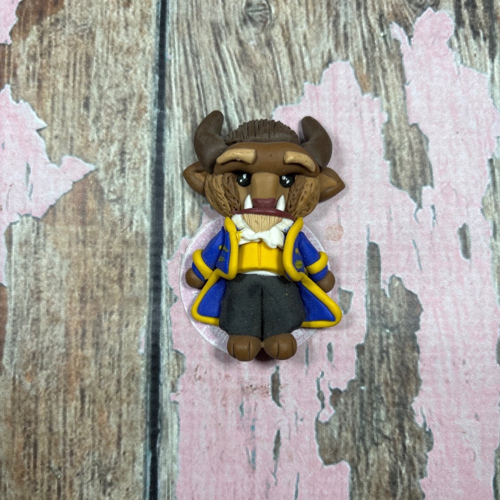 The Beast blue and yellow suit