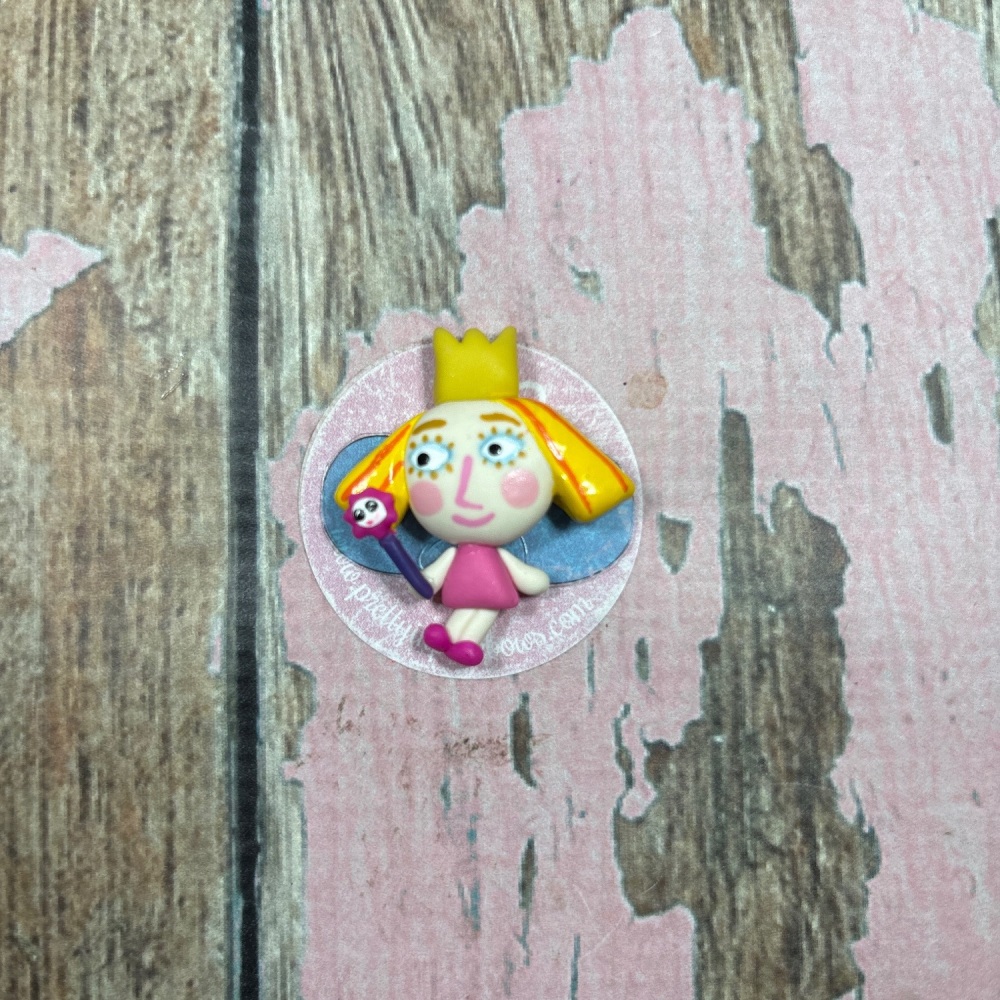 Little Holly yellow hair pink dress pink and purple wand