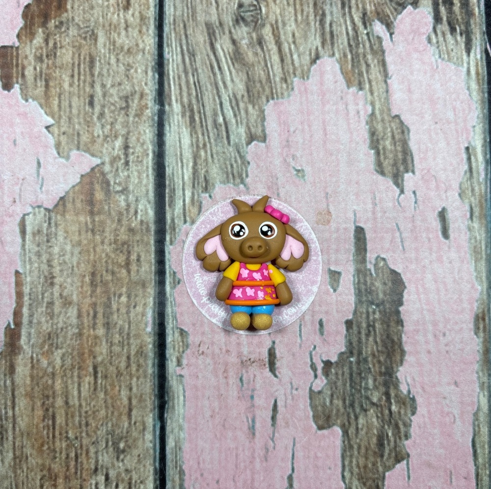 Little Elephant in a Yellow dress and pink bow