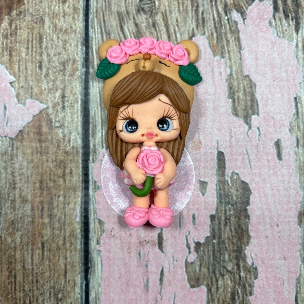 Big girl in teddy outfit pink roses