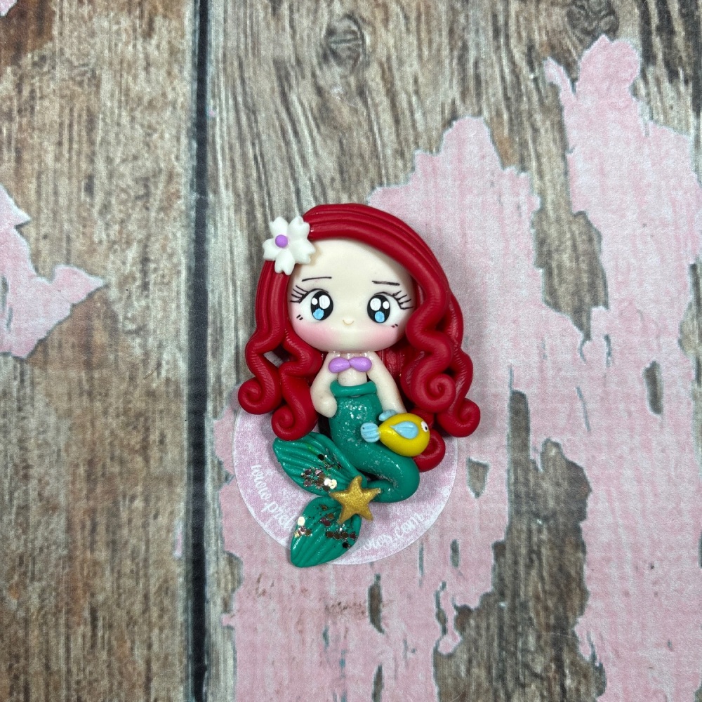 Little Mermaid Ariel with pink flower in her hair