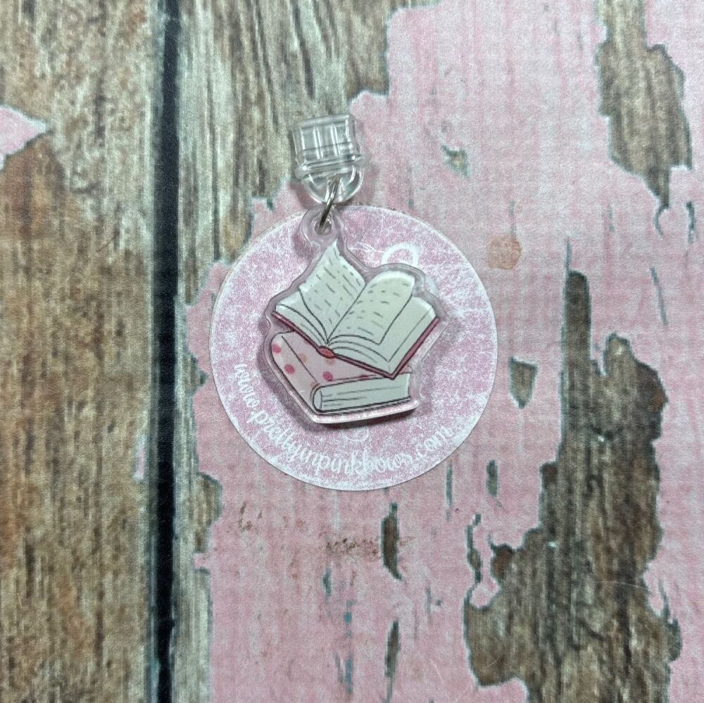 USB C cover- Pink books on top of each other