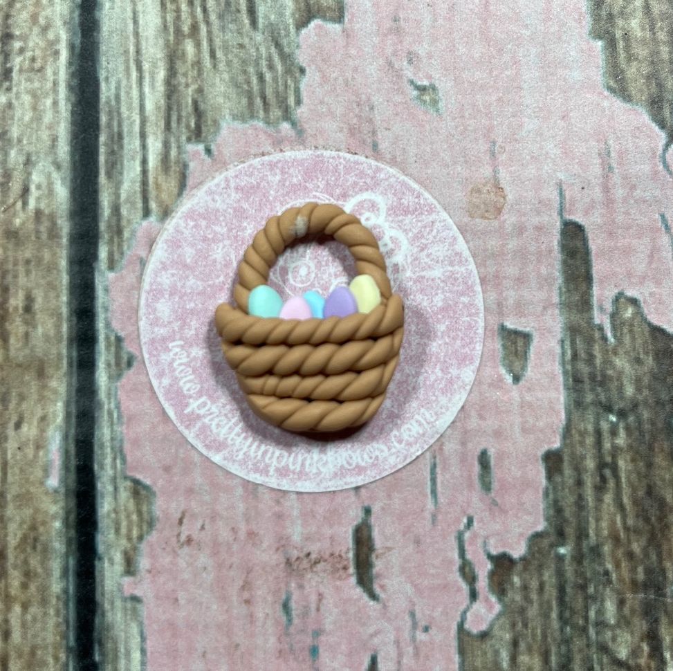 Little Easter Egg basket with colourful eggs inside