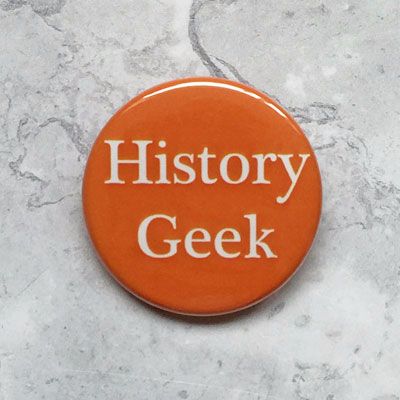 A round orange badge with 