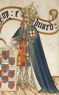 King Edward III in blue robes with a crown on his head.