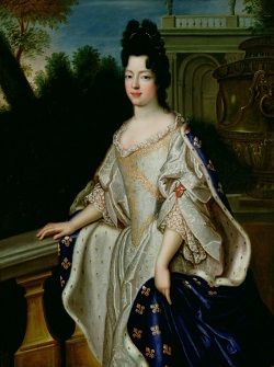 A portrait of Marie Adelaide of Savoy, her dark hair piled up on top of her head, wearing a white satin dress embroidered with gold and a blue cloak with gold fleur-de-lis.
