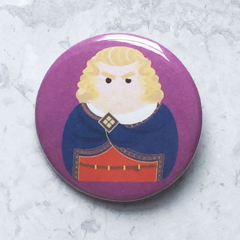 A round purple badge with an image of King Edward I.