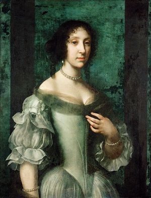 Claudia Felicitas of Austria, wearing a pale green dress and a necklace of pearls.