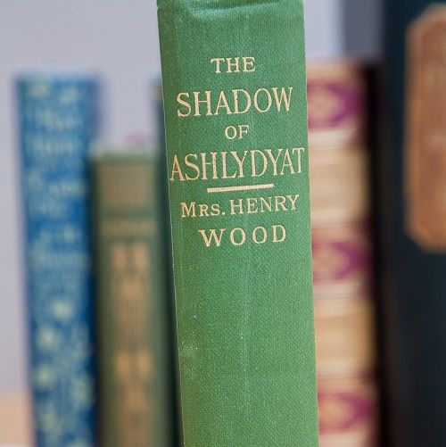 The spine of a green book and 