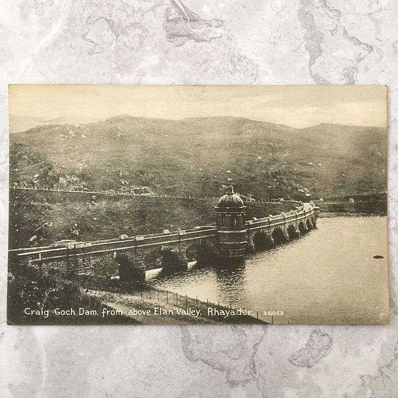 Front of a vintage postcard showing Craig Goch Dam.
