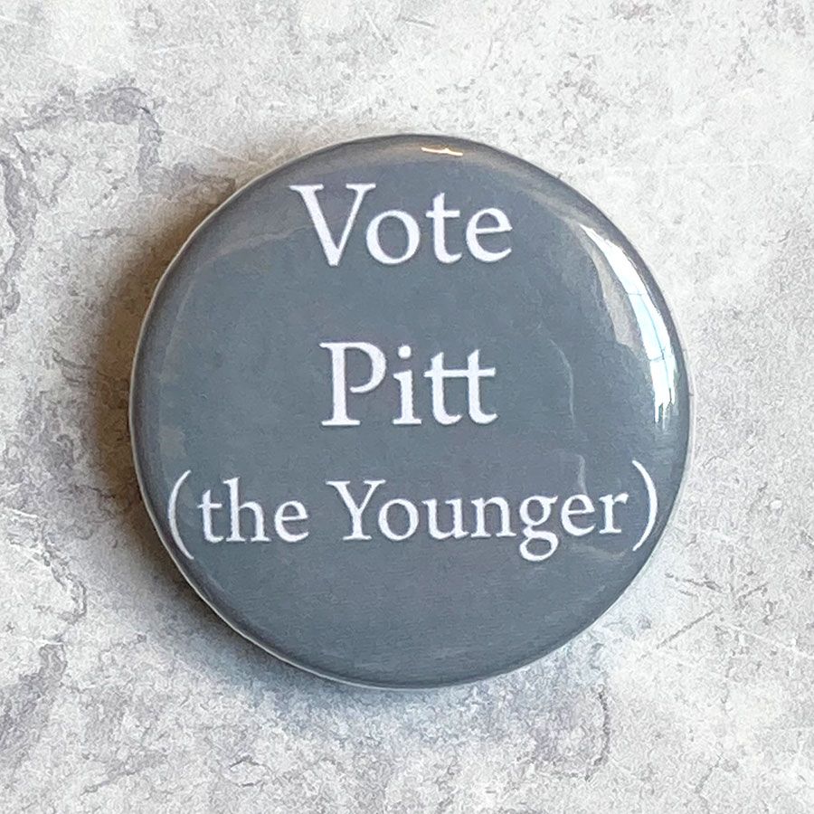 A round grey badge with 