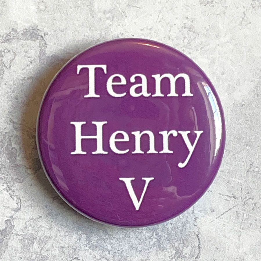 A round purple badge with 