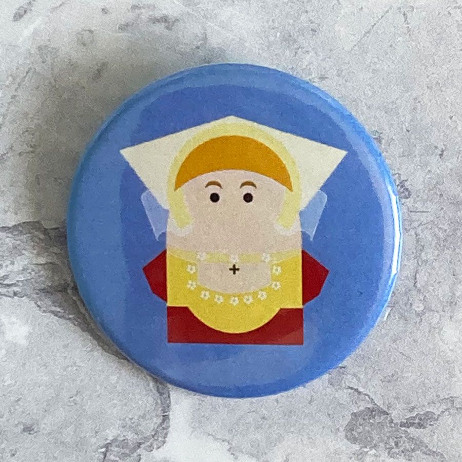 A round blue badge with an original illustration of Anne of Cleves.