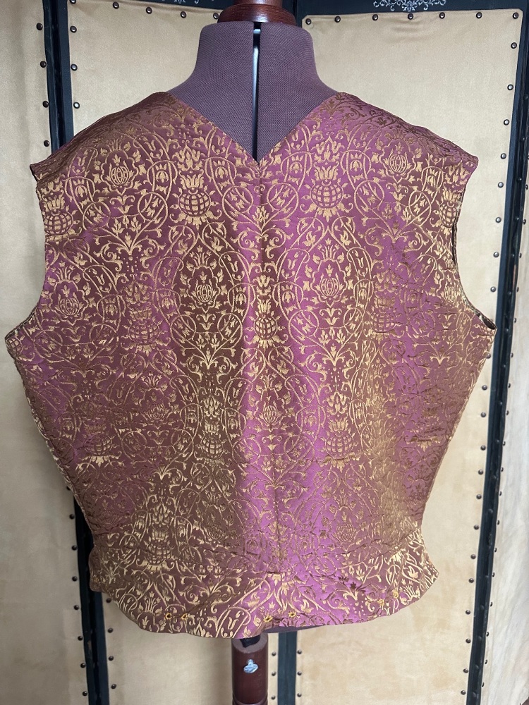 15th century sleeveless pourpoint in damask