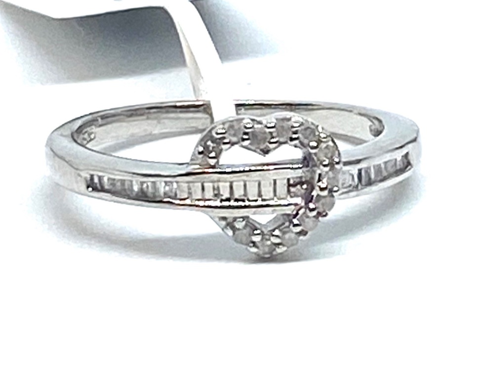 Diamond Ring Set in Silver   0.20cts    Size R