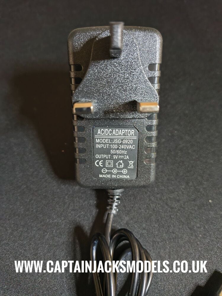 Mains 3 Pin UK Plug With Barrel Pin Output At 9v DC 2A